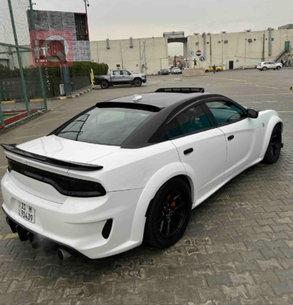 دۆج چارجەر